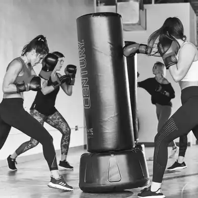 High-energy cardio kickboxing session at small group boot camp fitness class at Forge Athletics