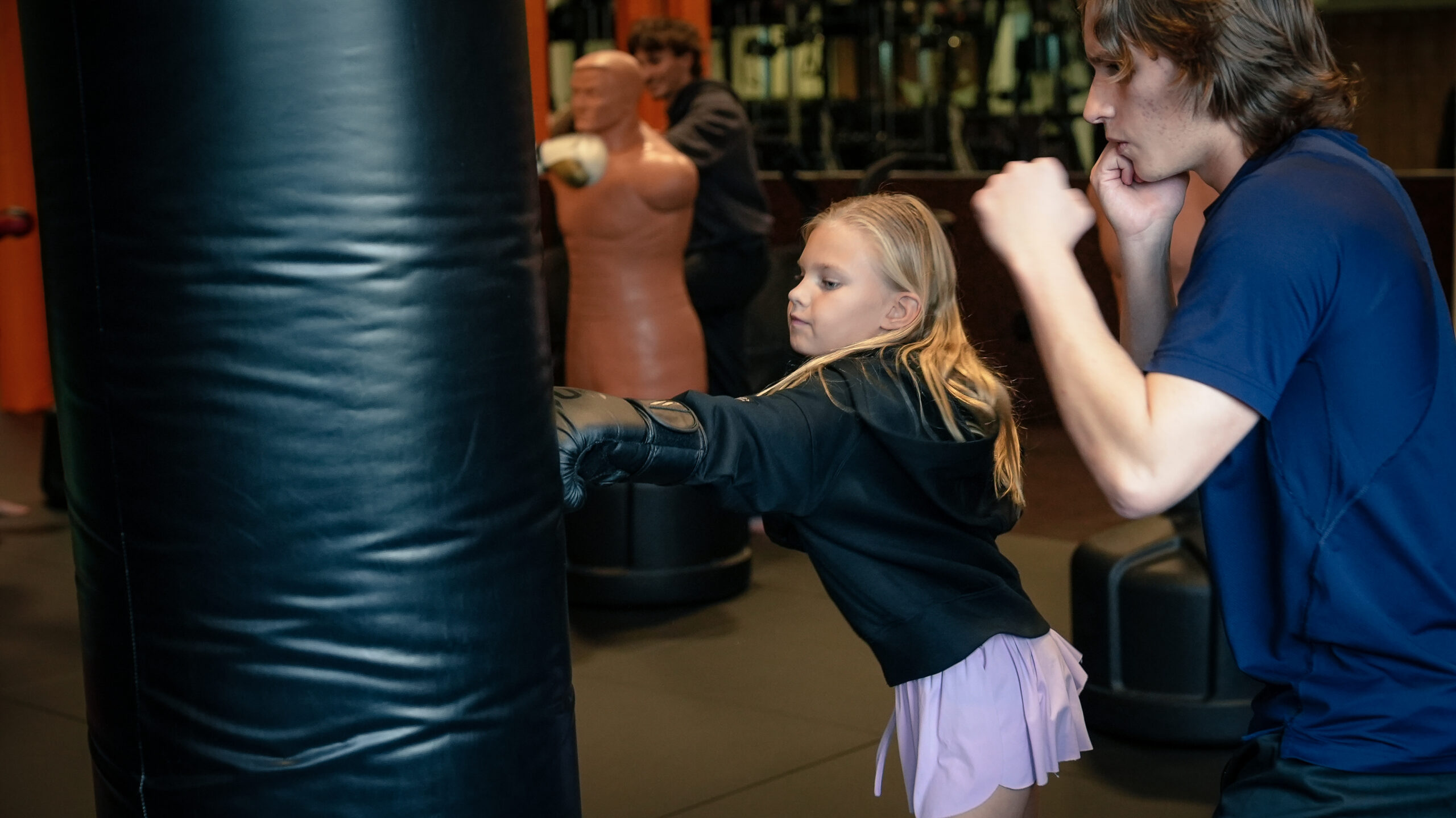 Girl training with coach at Forge Athletics summer camp in Naples FL